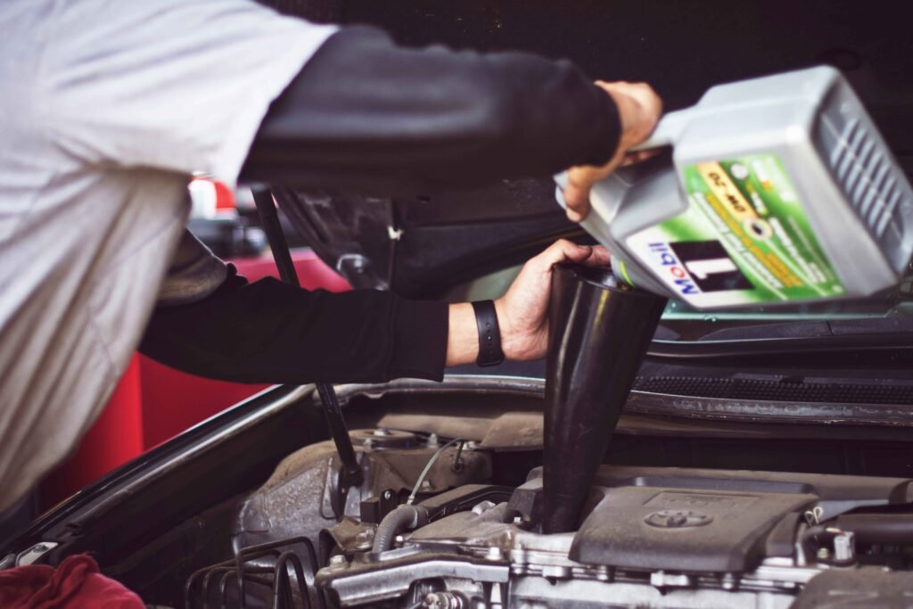 filling mobil-1 Engine oil in engine  